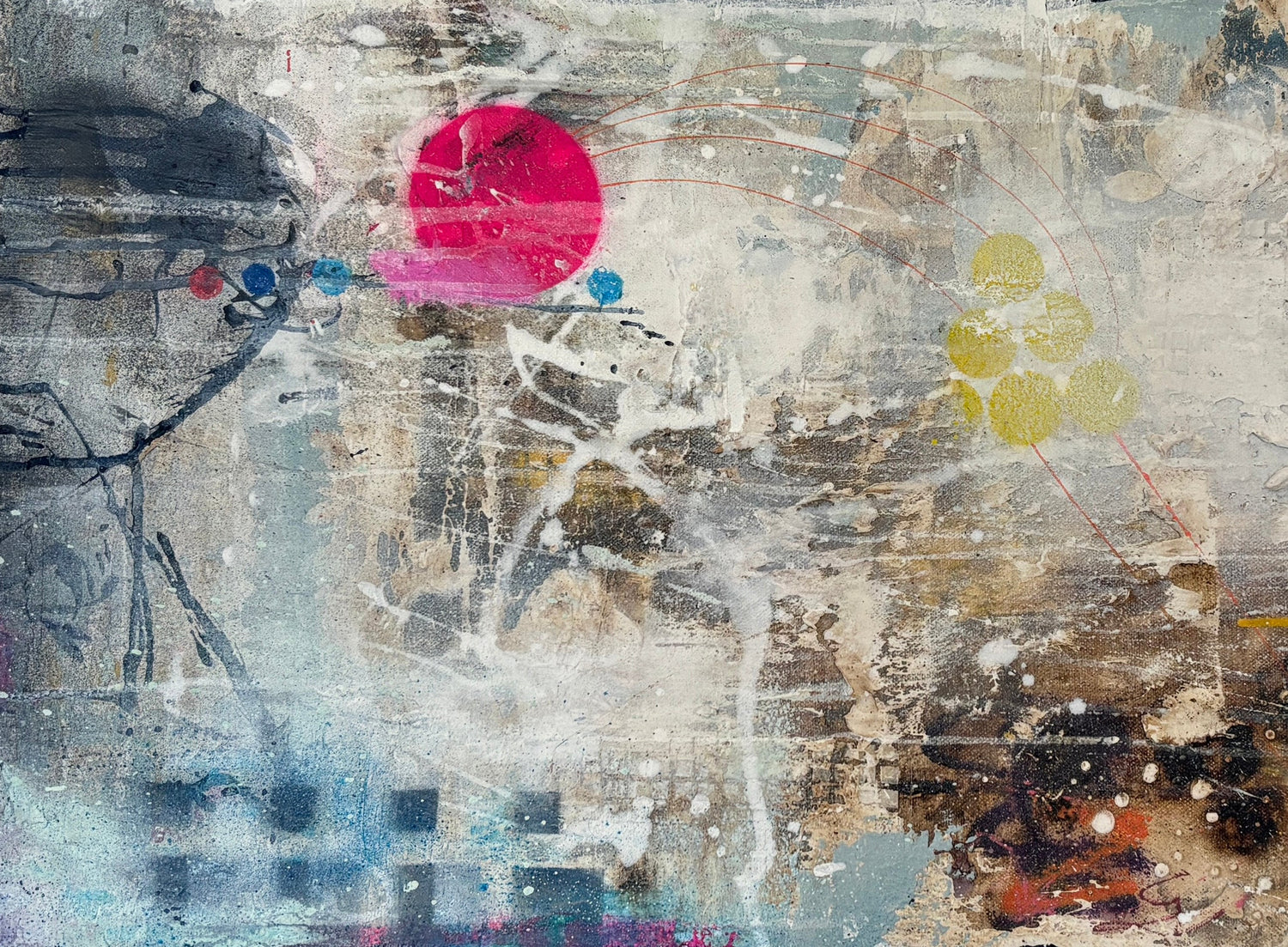 Abstract art piece with various colors and textures on a textured surface